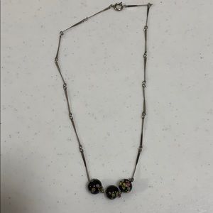 Necklace with three decorative balls